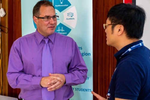 Dr. Shaun Nykvist in discussion with a participant