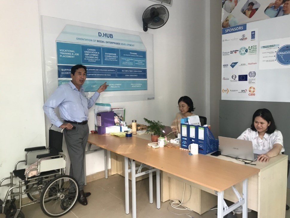 Nguyen Van Cu (standing) with his colleagues at DRD
